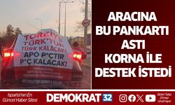 Aracına bu pankartı astı Korna ile destek istedi