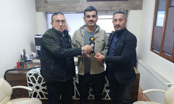 TİNGADER'DEN SERKAN AYGÜN'E PLAKET