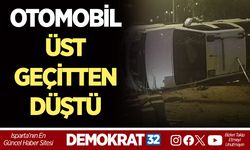 OTOMOBİL ÜST GEÇİTTEN DÜŞTÜ